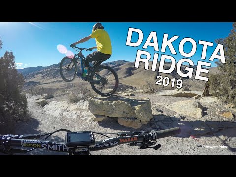 Nate Hills riding Dakota Ridge south on his mountain bike.