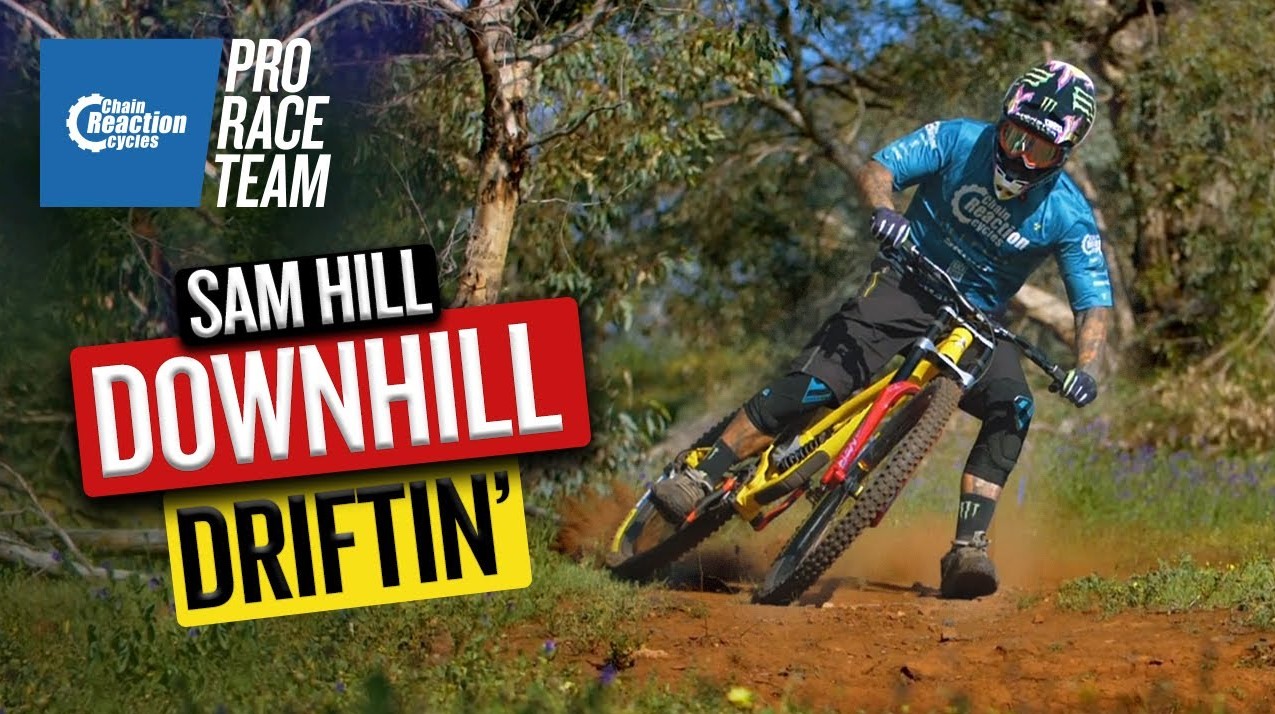 Sam Hill Downhill Driftin on a mountain bike.
